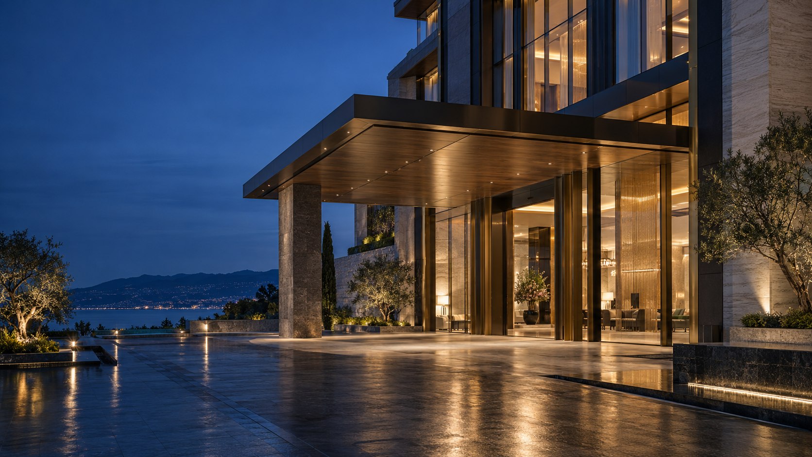 Contemporary hotel architecture with premium stone, glass and metal detailing